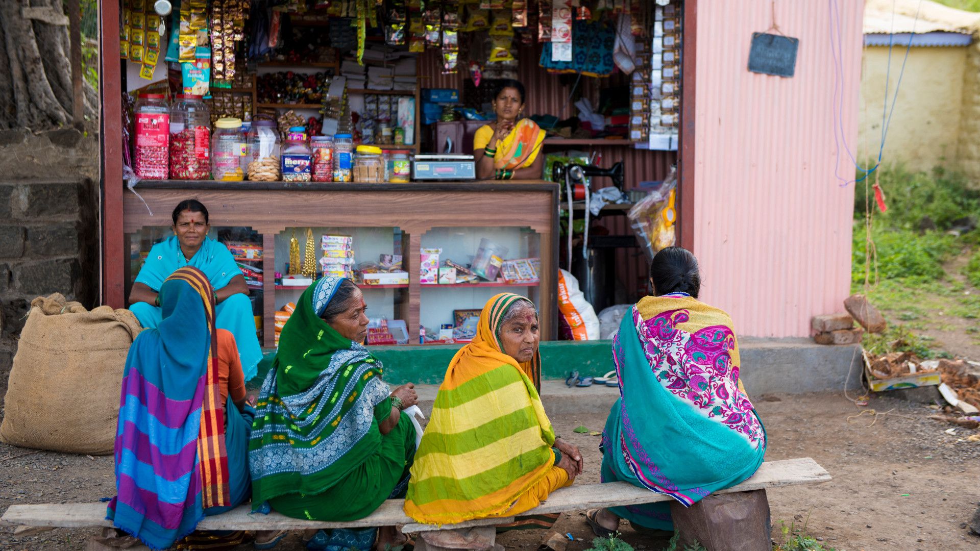 Five women in saris. A woman shopkeeper. Represents Unilever’s Shakti programme supporting rural entrepreneurship in India.