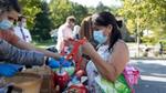 Food bank workers organizing food and supplies.