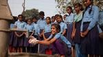 Schoolgirl washing hands