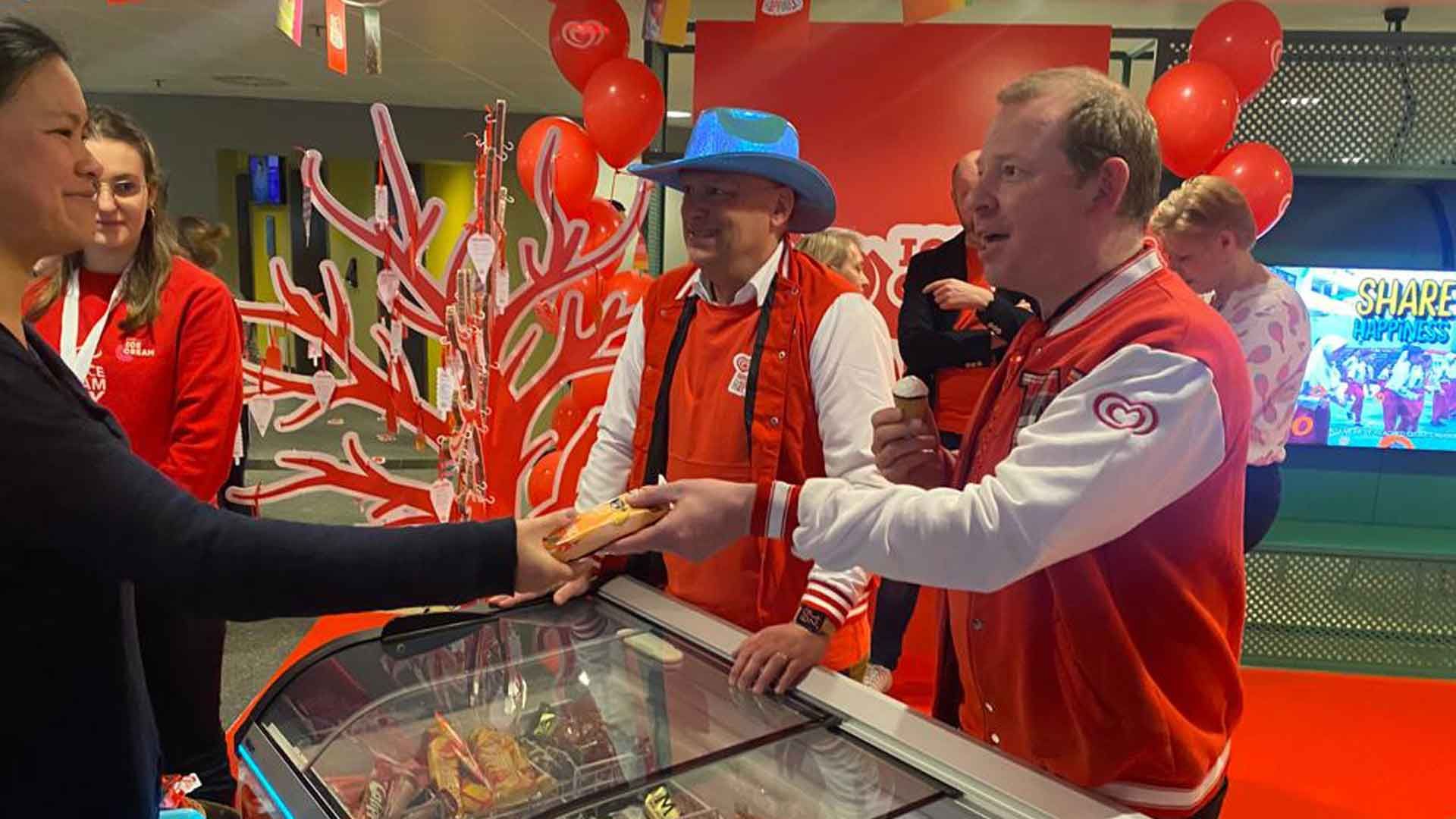 Matt Close with a Wall’s colleague handing out free ice creams on World Happiness Day 