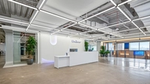 The reception desk in the new Hoboken Unilever office. Bright white desk with blue Unilever accents.